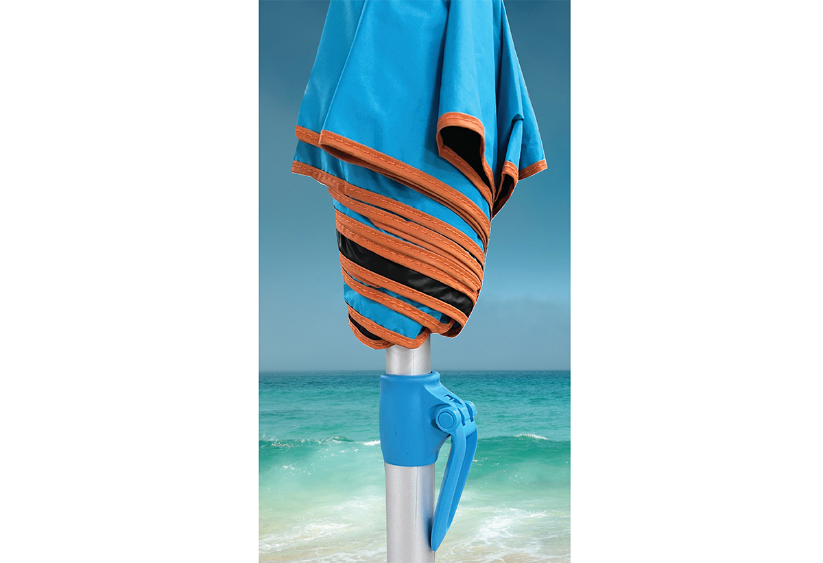 Απεικονίζεται η ομπρέλα κλειστή, ενώ στο background απεικονίζεται θάλασσα με κύμα